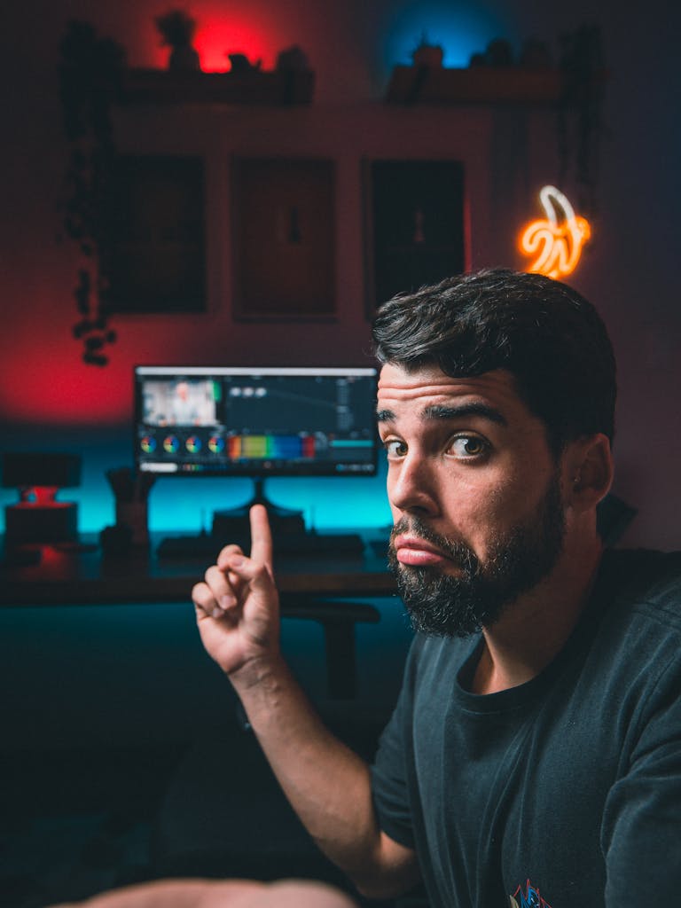 Man Pointing to a Computer